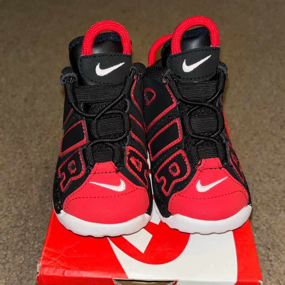 Like new toddler Nike Air Uptempo. Red, black and white size 5c.